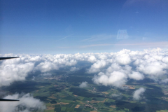 Luftbild_Motorflug_ueber_den_Wolken